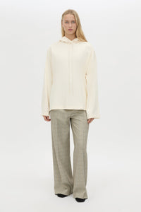 Front view CAMILLA AND MARC Studio Hoodie in White with relaxed long‑sleeve design and hooded silhouette. 