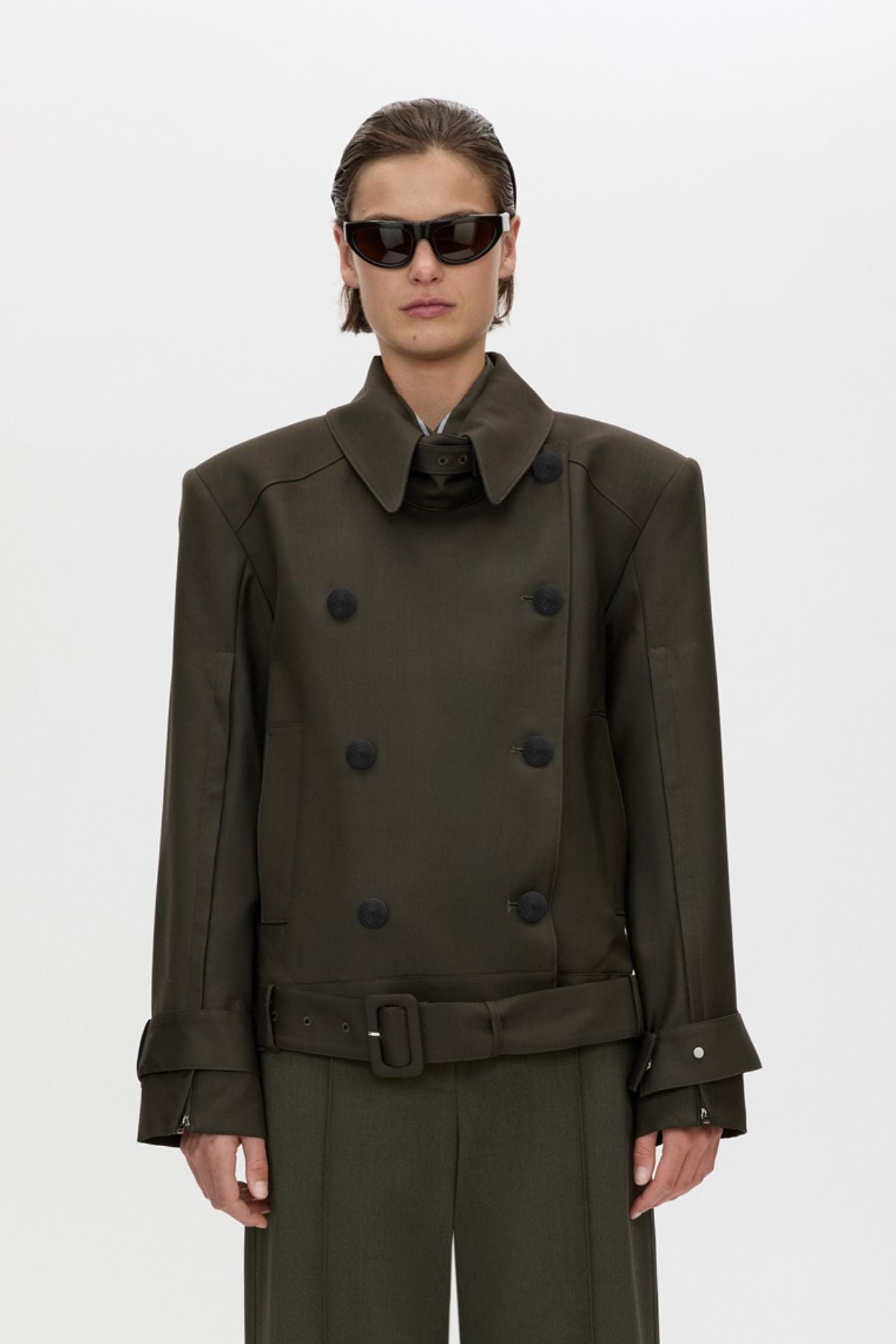 Cropped view CAMILLA AND MARC Tari Short Trench in Dark Khaki with contrast undercollar and shoulder pads.
