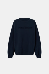 Ghost view CAMILLA AND MARC Tia Flocking Logo Crew in Deep Ink with relaxed fit, logo artwork and 100% cotton.