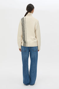 Back view CAMILLA AND MARC Tusk Detail Knit Turtleneck in Black with contrast jacquard stripe and Australian wool.