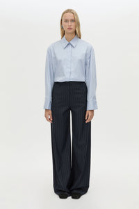 Front view CAMILLA AND MARC Tyler Long Sleeve Shirt in Sky Blue styled with the Brody Pant.