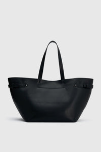 Back view CAMILLA AND MARC Willa Tote in Black with side strap and buckle detailing and magnetic button closure.