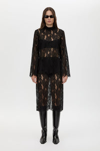 Front styled view CAMILLA AND MARC Zemira Long Sleeve Lace Top in Black with sheer lace and high neckband.
