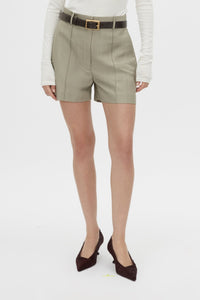 Cropped view CAMILLA AND MARC Seri Tailored Short in Stone Marle with a mid‑rise tailored cut and buckle detail.